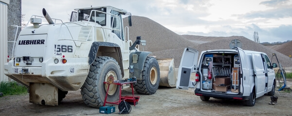 Chargeuse avec un camion Hydrokit